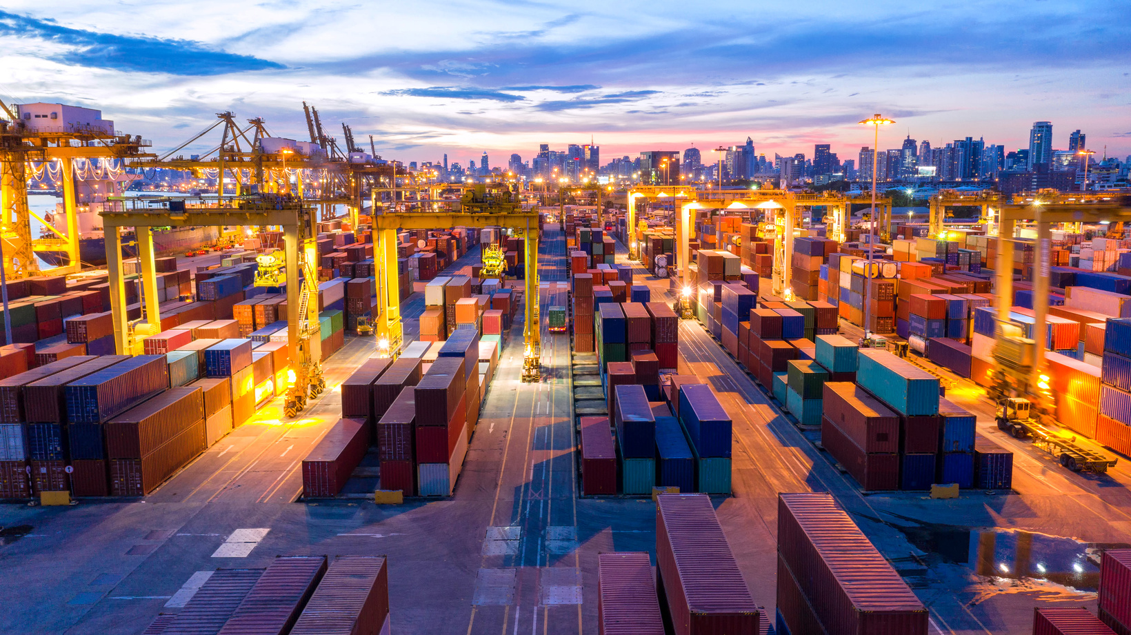 Container ship in export and import business and logistics. Shipping cargo to harbor by crane. Water transport International. Aerial view and top view.